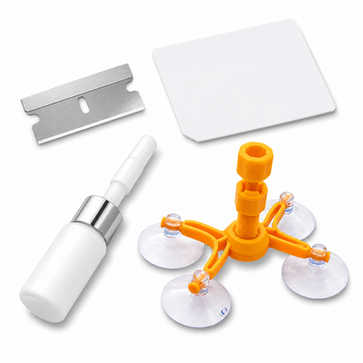 A window cleaning or repair kit on a white background, including a white and silver spray bottle, a silver razor blade, a white squeegee, and an orange four-prong suction cup tool with clear suction cups.
