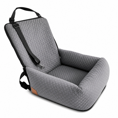 A gray quilted pet booster seat with black straps and a small tan accent patch, shown on a clean white background.