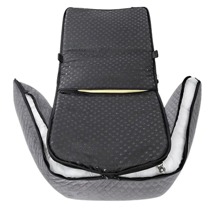 small dog resting on car seat travel bed cushion during road trip