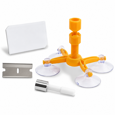 A 4-suction window clip set with an orange four-prong suction base, four clear suction cups, a white mounting card, a metal razor blade, and a white-and-silver window cleaner applicator, arranged on a white background.